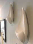 contemporary sculptural white plaster wall light, Curl Wall Sconce by lighting designer Hannah Woodhouse