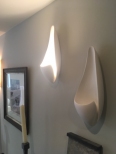 hand made sculptural wall light, contemporary white plaster wall sconce called Curl by Hannah Woodhouse