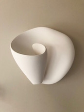 Hand Made Artisan Contemporary Plaster Wall Sconce, Tulip Wall Light giving soft ambient lighting for bedroom, hallway, and living areas by Hannah Woodhouse