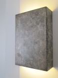 Contemporary etched steel wall light by Hannah Woodhouse. Shanghai steel contemporary wall light is available in two finishes, speckled french grey or dark bronze rust. 