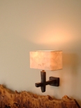 Contemporary bronze wall light with hand made eucalyptus paper lamp shade by Hannah Woodhouse.