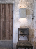Contemporary etched steel wall light by Hannah Woodhouse. Shanghai steel contemporary wall light is available in two finishes, speckled french grey or dark bronze rust.
